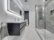 Modern bathroom features a large vanity and a glass enclosed shower at 1700 Lake Markham Rd, Sanford, FL 32771