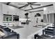 Modern kitchen with an island, white countertops, black hardware, and stainless steel appliances at 1700 Lake Markham Rd, Sanford, FL 32771