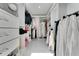 A well-organized walk-in closet with shelving and hanging space at 1700 Lake Markham Rd, Sanford, FL 32771