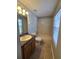 Bright bathroom featuring a tub, shower, and a vanity sink at 1754 Fritwell Ct, Ocoee, FL 34761