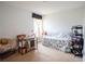 Bedroom featuring a desk and chair, bed, and storage for a variety of personal items at 1858 Snapper Dr, Poinciana, FL 34759