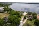 Aerial view of lakefront homes showing waterfront living with private docks and serene waters at 1947 Broadleaf Ct, Windermere, FL 34786