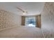 Spacious bedroom with sliding glass doors that lead to a pool at 1947 Broadleaf Ct, Windermere, FL 34786