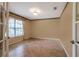 Bright office space with tile floors, a large window, and French doors for privacy at 1947 Broadleaf Ct, Windermere, FL 34786