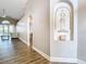 Hallway displaying decorative shelving and an open path to the living room at 2124 Fish Eagle St, Clermont, FL 34714