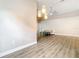 Inviting living area featuring wood floors and seamless flow into other rooms at 2124 Fish Eagle St, Clermont, FL 34714