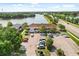 Beautiful aerial view of the building, lake, and the surrounding community at 214 Majors Ln # C, Kissimmee, FL 34743