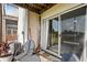Cozy patio area with seating, providing a comfortable spot to unwind and enjoy the outdoors at 214 Majors Ln # C, Kissimmee, FL 34743