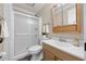 Neat bathroom with shower, vanity, toilet, mirror, and towel rack in a clean, compact layout at 2420 Kerridale St, Deltona, FL 32738