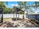 Metal pergola, perfect for outdoor dining, adds to the appeal of this property at 2420 Kerridale St, Deltona, FL 32738