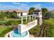Beautiful community entrance with landscaping and water feature at 2439 Dubai St, Kissimmee, FL 34747