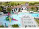 Community pool with a zero entry, play area, and plenty of seating in a resort-style setting at 2439 Dubai St, Kissimmee, FL 34747