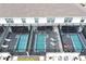 Aerial view of private pools enclosed within screened patios behind townhomes at 2439 Dubai St, Kissimmee, FL 34747