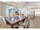 Open floor plan dining area connects seamlessly to the living room and kitchen spaces at 2479 Pine Preserve Ct, St Cloud, FL 34771