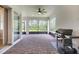 Enjoy this covered outdoor patio featuring brick flooring and ceiling fan, perfect for entertaining at 2479 Pine Preserve Ct, St Cloud, FL 34771