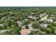 Aerial view of a community with mature trees and beautiful single-Gathering homes at 267 Osprey Hammock Trl, Sanford, FL 32771