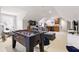 Finished basement with recreational area, including foosball table, drum set and wet bar at 267 Osprey Hammock Trl, Sanford, FL 32771
