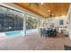 This beautiful screened-in pool and outdoor kitchen provides the perfect space for entertaining at 267 Osprey Hammock Trl, Sanford, FL 32771