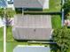 Aerial view of the home showcasing its roof, backyard, and surrounding landscaping at 2729 Stanwood Dr, Kissimmee, FL 34743