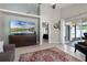 Bright living room featuring tile floors, a large flat screen television, and sliding glass doors to the patio at 2729 Stanwood Dr, Kissimmee, FL 34743