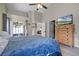Light and airy main bedroom with vaulted ceiling, dresser, walk-in closet and patio access at 2729 Stanwood Dr, Kissimmee, FL 34743