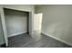 Bedroom with a closet and grey laminate flooring at 285 Marion Oaks Crse, Ocala, FL 34473