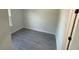 Cozy bedroom with gray vinyl flooring, neutral paint and good natural light at 285 Marion Oaks Crse, Ocala, FL 34473