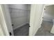 Well-organized walk-in pantry with wire shelving that offers an abundance of storage space for all your needs at 285 Marion Oaks Crse, Ocala, FL 34473