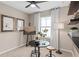 Bedroom featuring an easel, artist decor, and wall shelving with plants at 3367 Vine Leaf St, Apopka, FL 32712