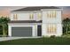 Charming two-story home featuring a two-car garage, well-maintained lawn, and classic white siding at 3373 Orange Rose Loop, Apopka, FL 32712