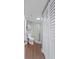 The bathroom features a unique glass block shower and wood-look flooring at 400 E Colonial Dr # 207, Orlando, FL 32803