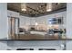 Close up of a modern kitchen with stainless steel appliances and granite countertops at 400 E Colonial Dr # 207, Orlando, FL 32803