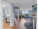 Open-concept living and dining area with modern decor and lots of natural light at 400 E Colonial Dr # 207, Orlando, FL 32803