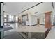 Elegant lobby features tiled floors, stone accents, columns, and ample space for seating and gatherings at 400 E Colonial Dr # 207, Orlando, FL 32803