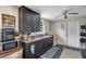 Functional kitchen featuring dark cabinets, a white range, and ample counter space at 405 Willow Ave, Sanford, FL 32771