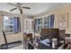 Bright office space with large windows, desk, and a treadmill for staying active at 405 Willow Ave, Sanford, FL 32771