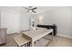 Well-lit office featuring a modern desk setup, neutral color scheme, and ample storage space at 4065 Shadowind Way, Gotha, FL 34734