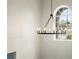 Chandelier with natural light from an arched window at 4065 Shadowind Way, Gotha, FL 34734