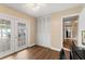 Comfortable bedroom with sliding glass doors leading to the patio, closet, and adjacent hallway at 407 Westchester Dr, Altamonte Springs, FL 32701