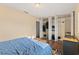 Comfortable bedroom with ample closet space and neutral decor, offering a relaxing retreat at 407 Westchester Dr, Altamonte Springs, FL 32701