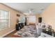 Comfortable living room featuring a plush sofa, a flat screen TV and decorative area rug at 407 Westchester Dr, Altamonte Springs, FL 32701