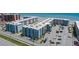 Aerial view of a beachfront condo community with pool and parking at 4153 S Atlantic Ave # 2120, New Smyrna Beach, FL 32169
