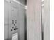 Interior view of elevator with modern fixtures, smooth stainless steel, and easy-to-use controls at 4153 S Atlantic Ave # 2120, New Smyrna Beach, FL 32169