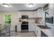 Well-equipped kitchen featuring stainless steel appliances, ample counter space, and great natural light at 500 W Oakland Ave, Oakland, FL 34760