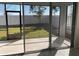 Screened-in porch providing great views of a well-maintained lawn and fenced backyard at 605 Big Pine Ave, Minneola, FL 34715