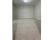 Neutral bedroom featuring plush carpeting and great natural light at 6428 Lynn Rd, Orlando, FL 32810