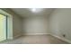 Neutral bedroom featuring plush carpeting and great natural light at 6428 Lynn Rd, Orlando, FL 32810
