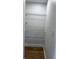 Walk-in pantry with wire shelving providing ample storage space in a compact area at 6428 Lynn Rd, Orlando, FL 32810