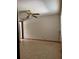 Bedroom with tiled floor, fan and a neutral color palette, flooded with natural light from the window at 6616 Blanche Ct, Orlando, FL 32818