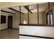 Open living room featuring decorative columns and a ceiling fan at 6616 Blanche Ct, Orlando, FL 32818